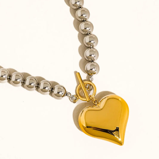 RAISSA GOLD TWO TONE HEART NECKLACE