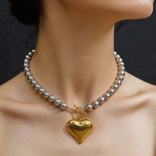 RAISSA GOLD TWO TONE HEART NECKLACE